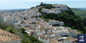 Beautiful views of the village of Casares among the green of the mountains in Mñalaga