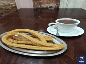 Breakfast with churros and chocolate in the cafeteria "Don Pepe".
