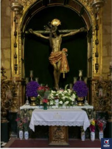 Remedio de Ánimas on his altar